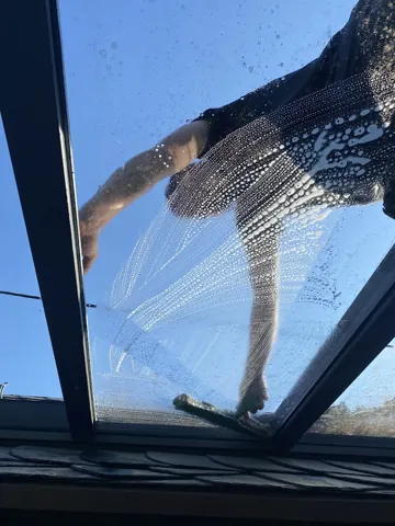 Reinigung einer Dachverglasung
